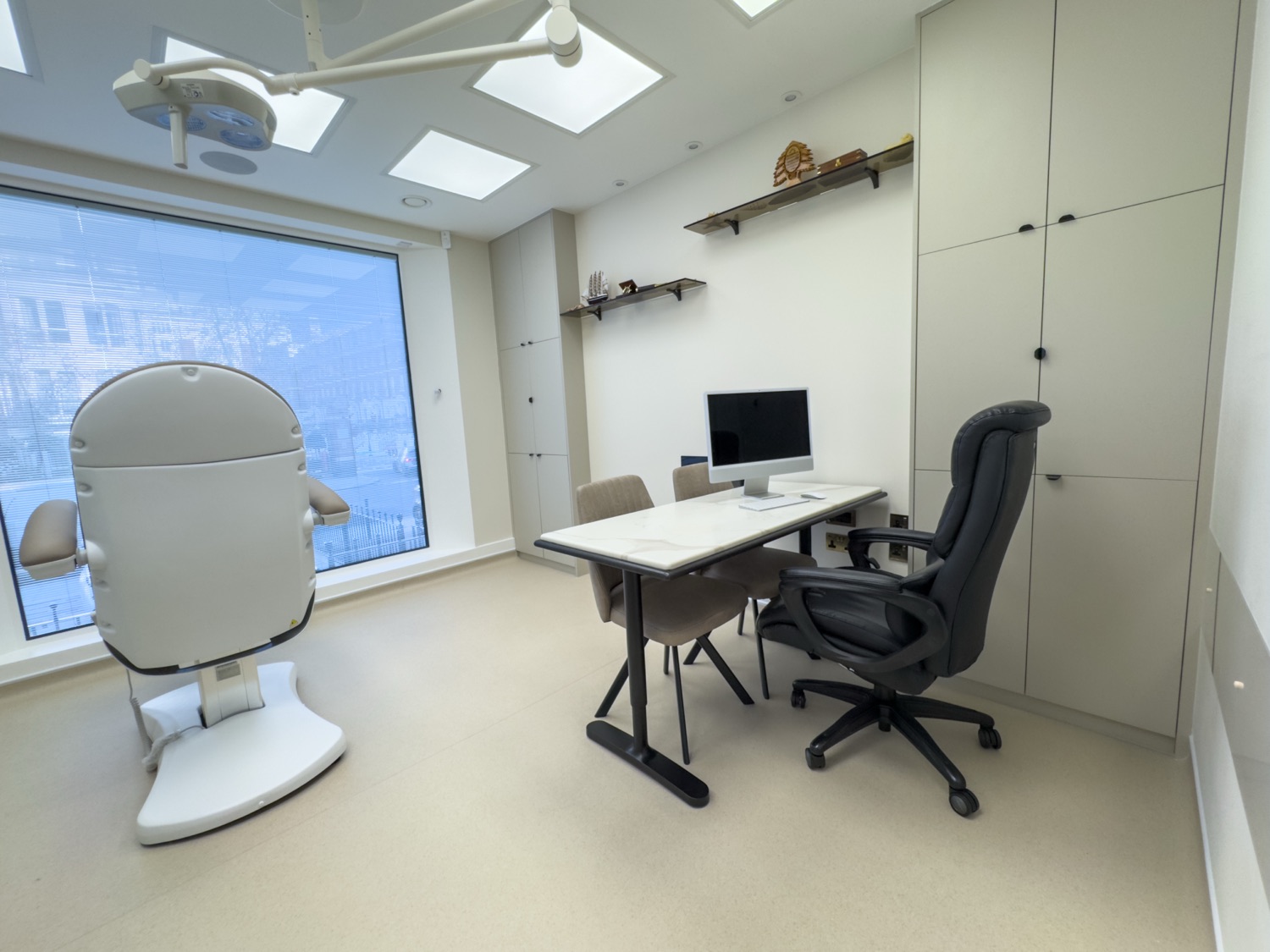 Calm, private recovery room with natural light at Kensington Cosmetic Clinic