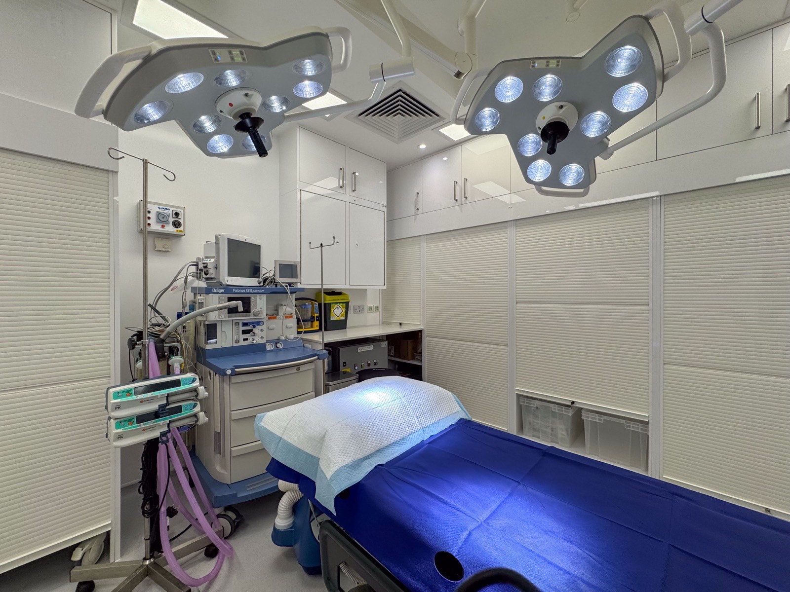 Operating theatre at Kensington Cosmetic Clinic with KLS Martin surgical lights and AneticAid operating table